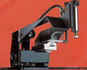 Figure 2. Auto vision placer with magnetic base, camera, mirror arm, the suction pipette (below) and the solder instrument with the soldering iron (at the back)